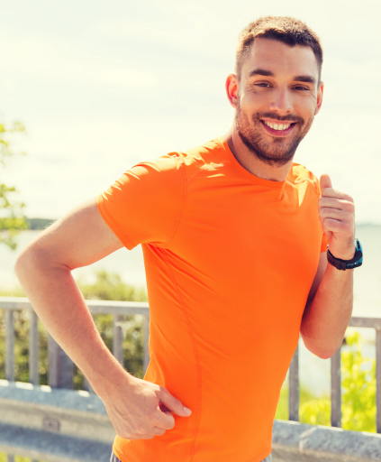 fitness-sport-people-technology-and-healthy-lifestyle-concept-smiling-young-man-with-heart-rate-watch-running-at-summer-seaside.jpg